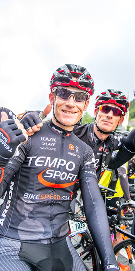 Compete in the Engadin Road Bike Marathon as a team.